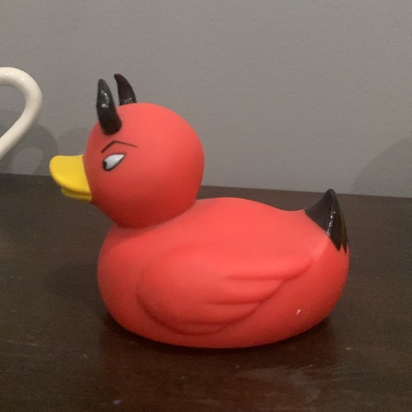 A collection of rubber ducks. - Picture 2 of 8